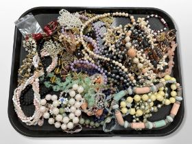 A collection of costume bead necklaces, brooches,