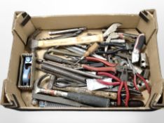 A box of vintage hand tools