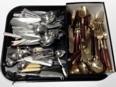 A collection of Thai brass cutlery and further stainless steel table cutlery