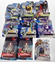 Nine Mattel and other figures including Max Steel, Voltron, etc.