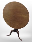A George III style mahogany tilt top occasional table,