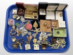 A group of costume brooches, earrings,