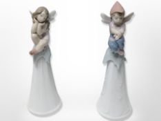 Two Lladro figural bells, It's a Boy and It's a Girl, boxed.