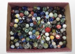 A box of assorted vintage glass marbles