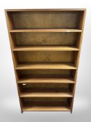 A Danish teak effect open bookcase,