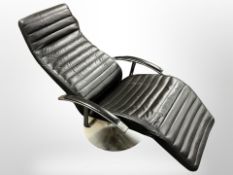 A Scandinavian chrome and black stitched leather swivel chair,