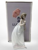 A Lladro figure - Afternoon Promenade, number 7636, boxed.