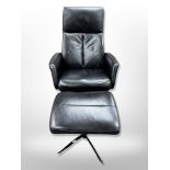 A Hjort Knudsen stitched black leather swivel armchair with matching footstool