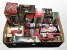 A box of die cast cars including Burago, Ertl,