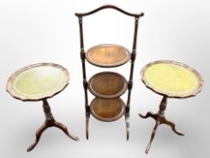 An Edwardian mahogany three tier cake stand together with a pair of reproduction wine tables