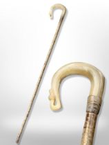 A hazel wood shepherd's crook with carved horn handle with thistle terminal, length 115cm.