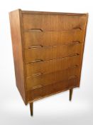 A Danish teak and ply wood six drawer chest,
