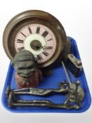 An antique wall clock with weights and pendulum together with cast iron money box,