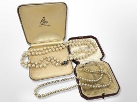 A double-strand cultured pearl choker with split-pearl and enamel gold clasp,