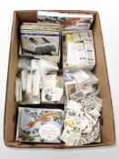 A box of cigarette cards and tea cards including John Player & Sons,