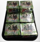 Eight Doctor Who Battles in Time trading card box sets.