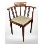 A Victorian mahogany and satin wood inlaid corner armchair
