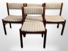 A set of four 20th century Danish dining chairs in striped oatmeal fabric