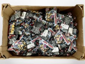A box of Hasbro Transformers miniature bagged toys.