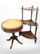 A reproduction mahogany drum table and a Victorian inlaid walnut what not