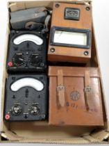 Scientific instruments to include Megger ohmmeter, three universal AVOmeters, one in leather case,