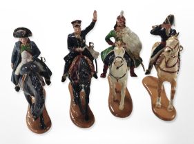 A group of French hand-painted diecast cavalry figures.