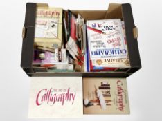 A collection of calligraphy items, boxed brushes and inks, pencils,