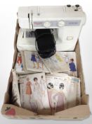 A Newhome electric sewing machine with lead and pedal,