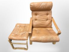 A 20th century Danish bentwood and stitched tan leather armchair with footstool