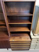 A Danish rosewood open bookcase, fitted four drawers beneath,