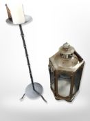 A reproduction metal lantern and pricket candlestick,