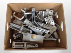 A box of door fittings,