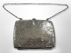 An engraved silver purse,