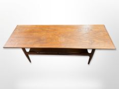 A 20th century Danish teak coffee table with under-shelf,