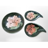 Three pieces of Moorcroft pink hibiscus pottery to include a bowl, diameter 14.