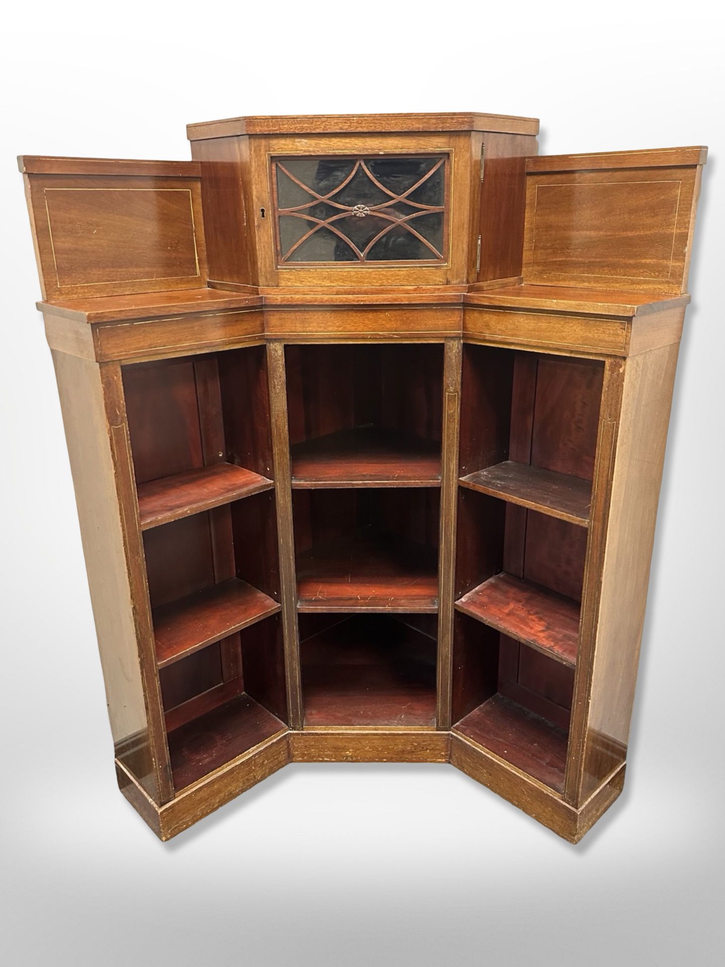 A 19th century continental mahogany corner bookcase,