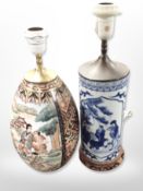 A 20th century Chinese blue and white porcelain table lamp on carved hardwood base together with a