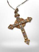 A gold plated crucifix pendant on 9ct gold trace chain