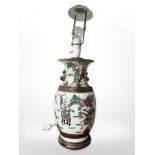 An early 20th century Chinese earthenware baluster vase converted to a table lamp (Continental