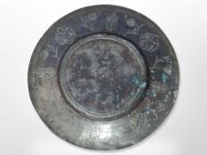 An antique engraved pewter dish, diameter 26.