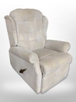 A manual reclining armchair