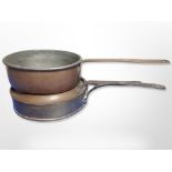 Two 19th century copper long handled cooking pans, one with lid,