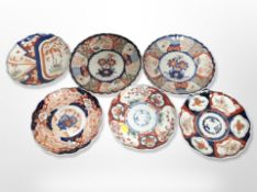A group of six late 19th century Japanese Imari scalloped plates,