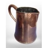 A 19th century copper jug,