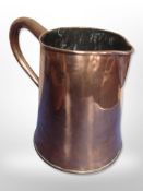 A 19th century copper jug,