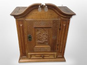 A 19th century Scandinavian carved oak wall cabinet,