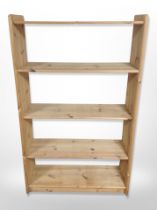 A pine open bookcase,