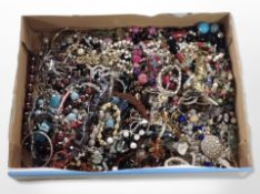 A large shallow tray of assorted costume jewellery