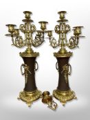 A pair of Empire-style ormolu five sconce table candelabra,