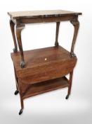 A mahogany low table on claw and ball feet, width 66 cm,